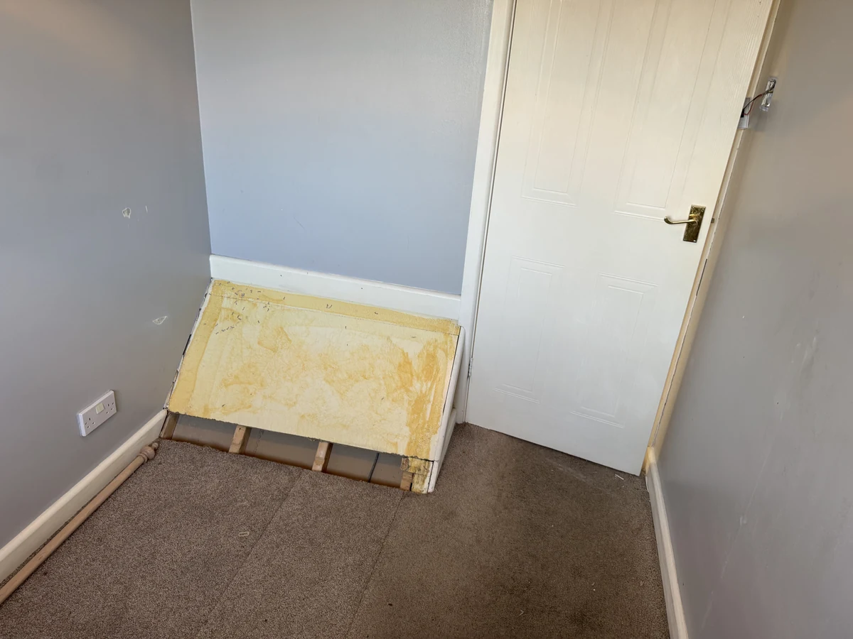 Two-tone grey-blue bedroom walls painted in West Cross Swansea by Daffodil Decor