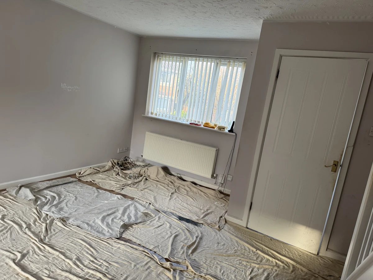 Bedroom painting with grey walls and white door by Daffodil Decor interior decorators in Plasmarl Swansea