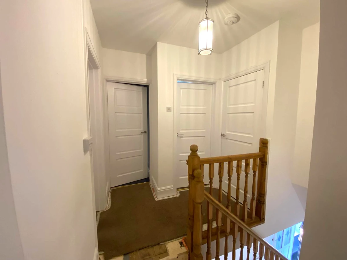 Bedroom painting with pink walls in Bishopston by Daffodil Decor