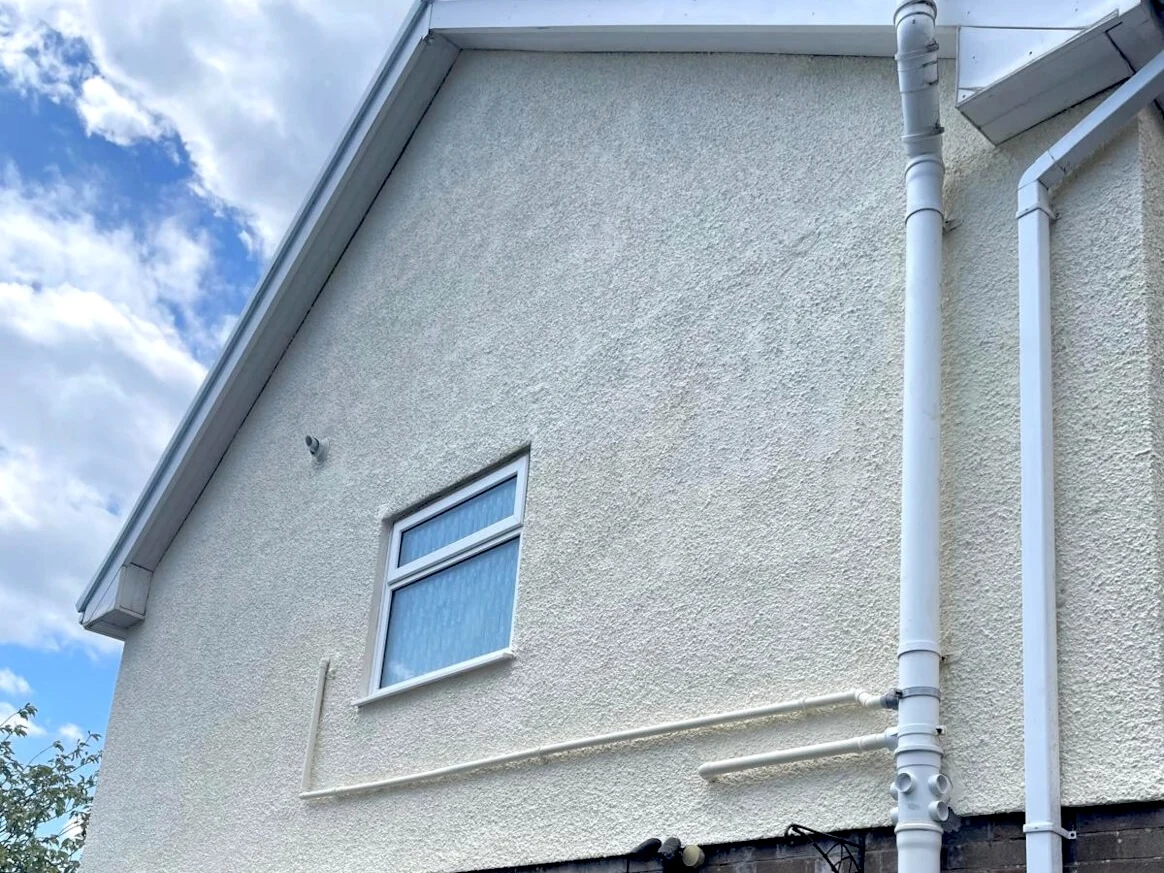 Pebbledash exterior repainted on a Port Talbot property by Daffodil Decor