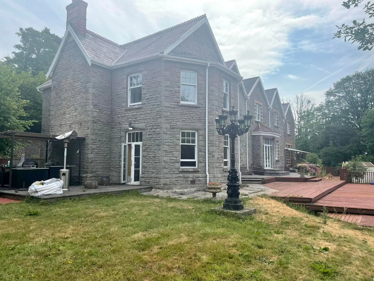 White painted bungalow exterior in Swansea by Daffodil Decor