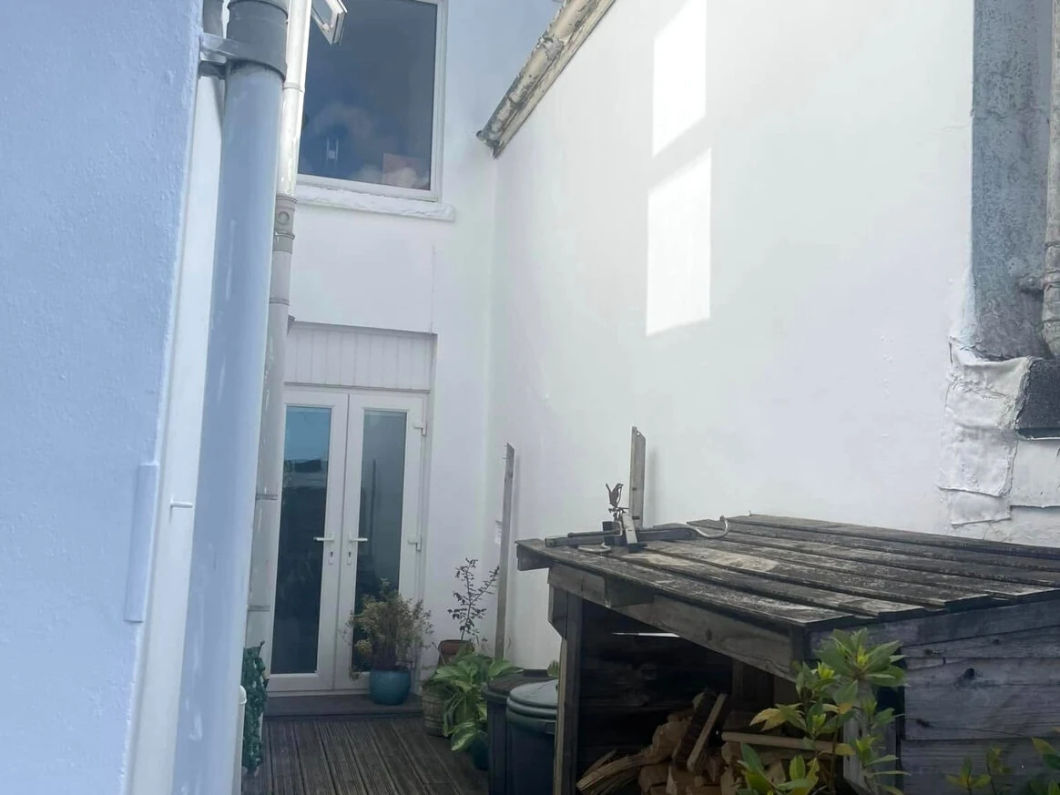 House painting in Langland by Daffodil Decor, white painted exterior on a detached property