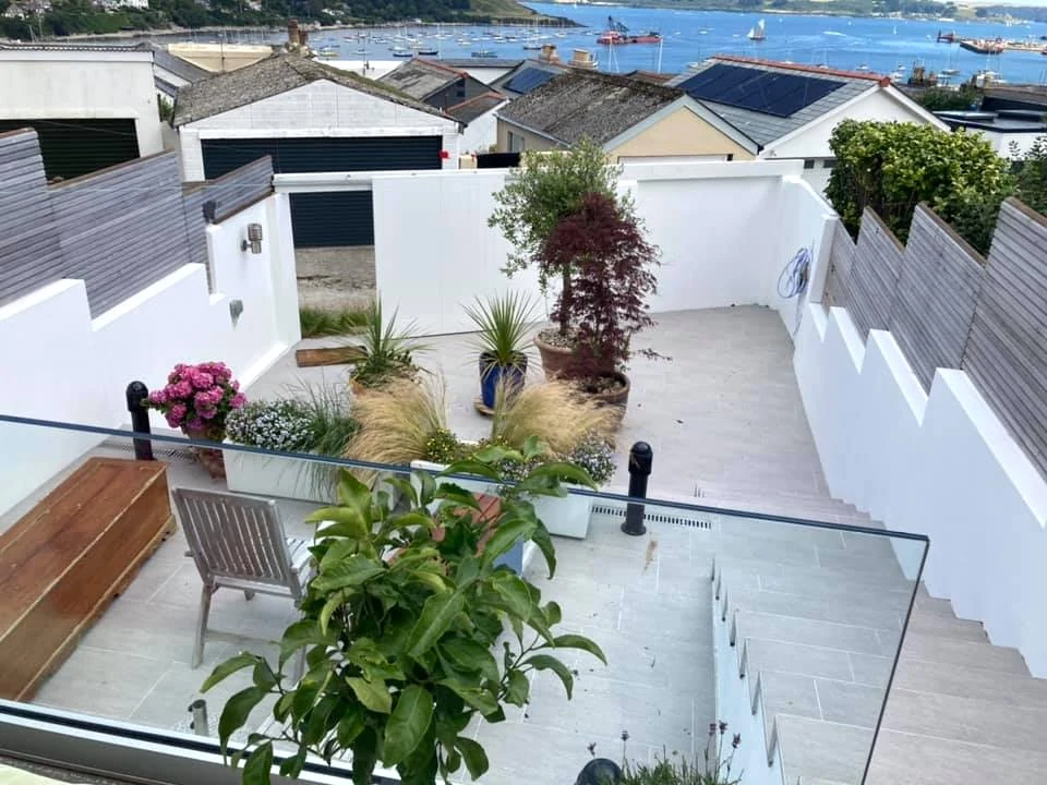 Painted stone house gable end in Newton, Mumbles by Daffodil Decor