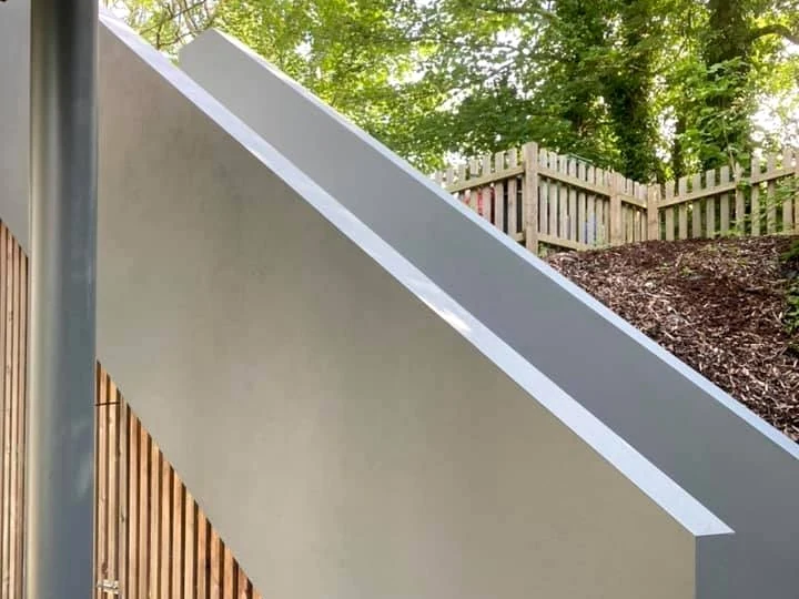 House painting on a terraced property in Pontardawe by Daffodil Decor, white painted exterior