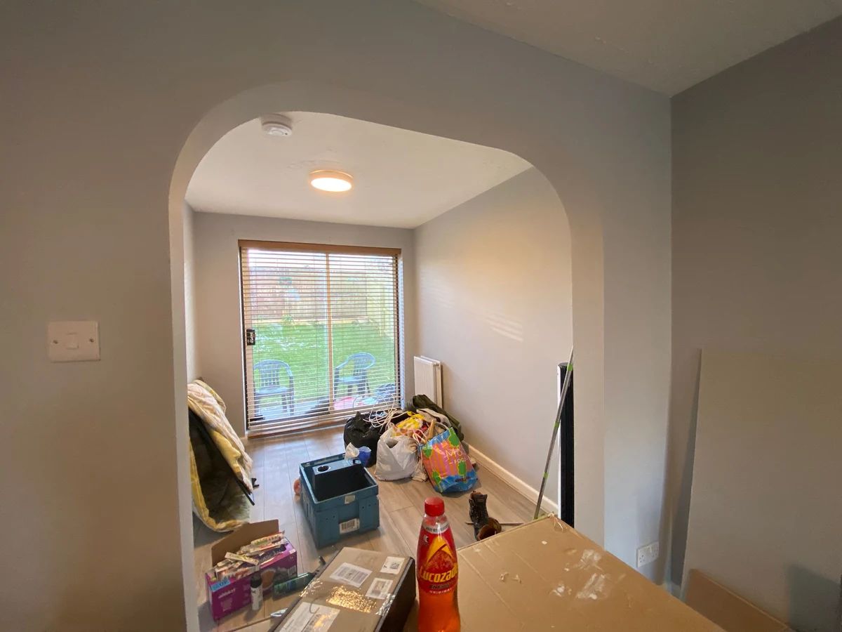 Interior painting with archway and dining room in Manselton by Daffodil Decor