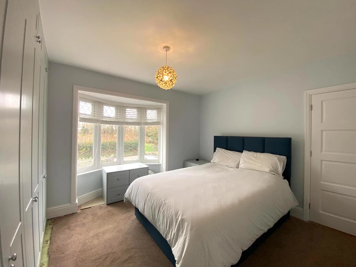 Kitchen painting with white walls and grey cabinets in Bishopston by Daffodil Decor