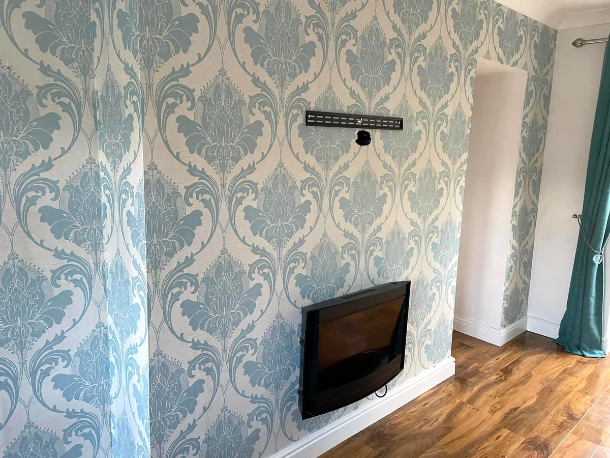 living-room-painting-blue-damask-wallpaper-feature-wall-swansea-daffodil-decor-1 Blue damask wallpaper feature wall, Swansea