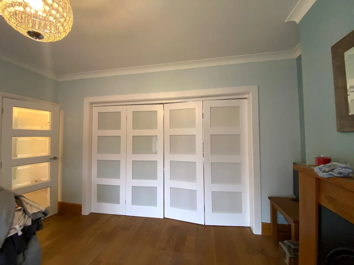 living-room-painting-blue-walls-white-trim-3-swansea-daffodil-decor Interior living room painting with blue walls and white trim in Morriston