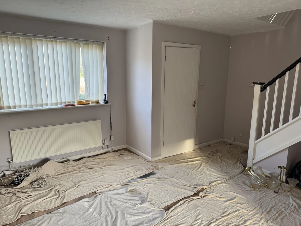 Painting services in West Cross Swansea — grey walls and staircase view by Daffodil Decor