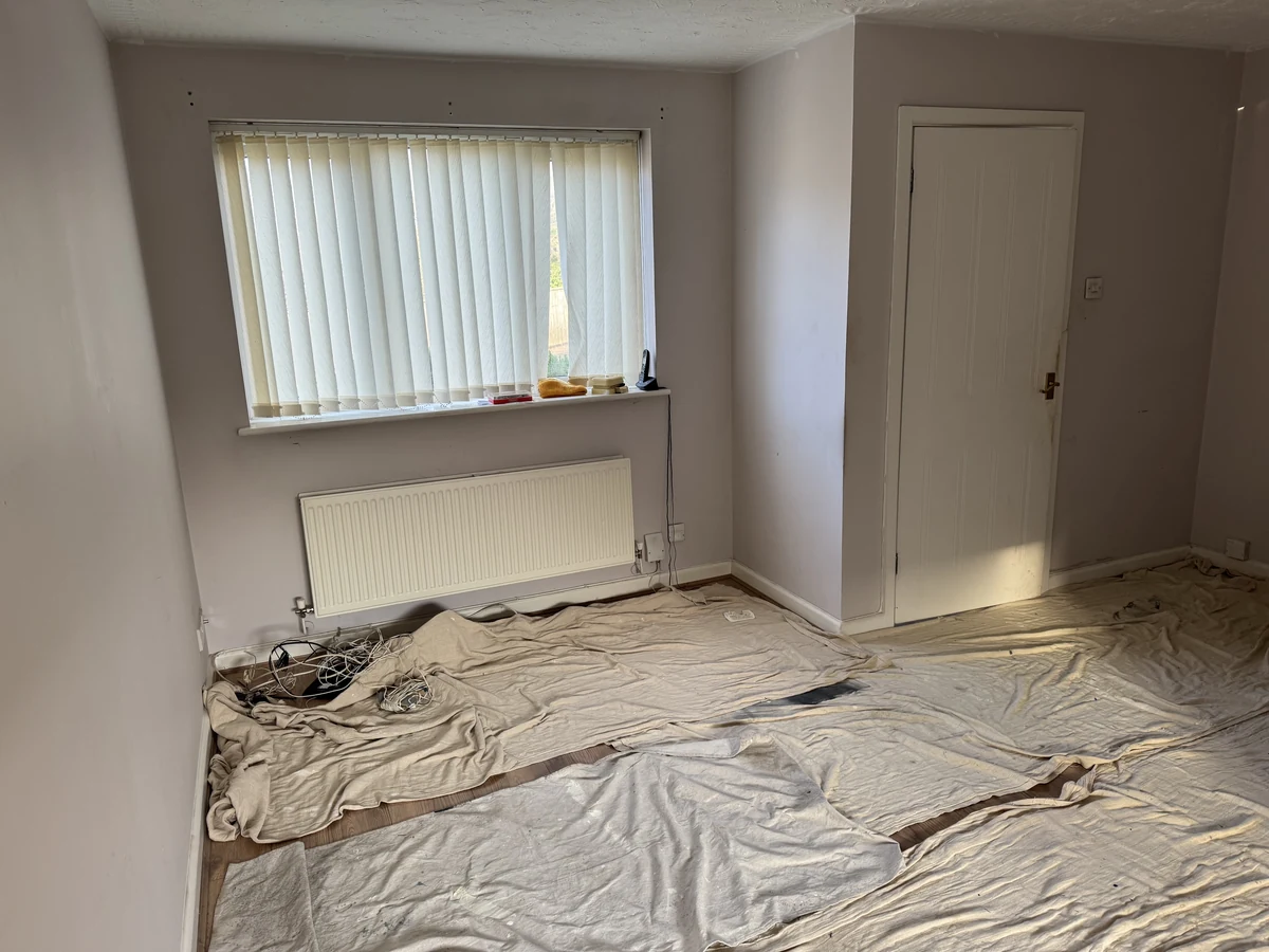 Living room painting with grey walls in Landore property