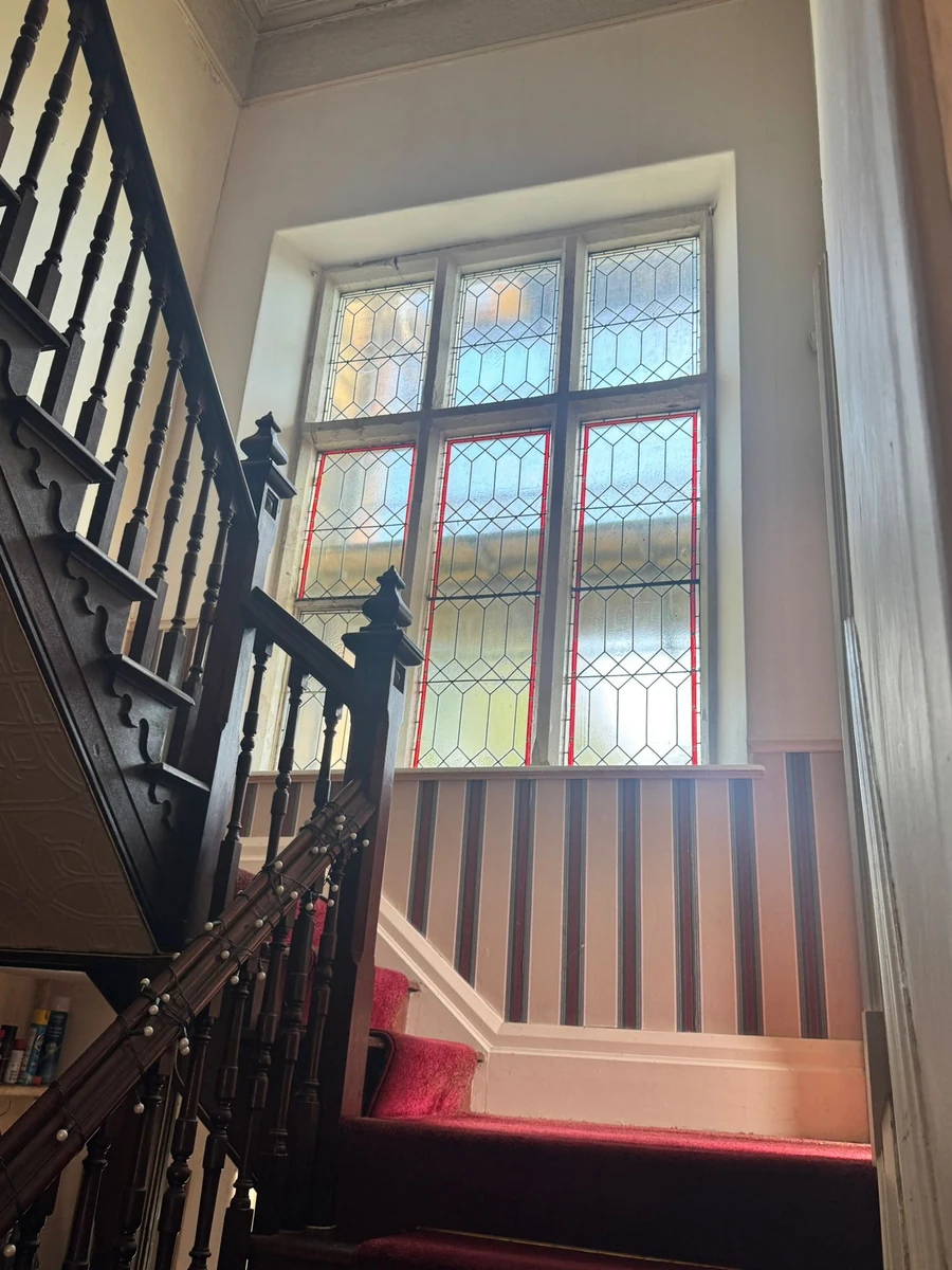 period-staircase-hall-repainted-swansea-daffodil-decor the same wall filled, sealed and repainted, Swansea
